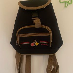 Backpack. Small Black backpack with Canadian flag emblem